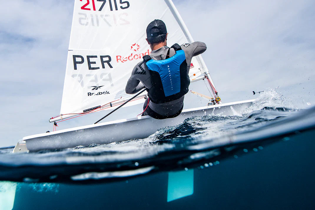 Male racing with Buoyancy Aid